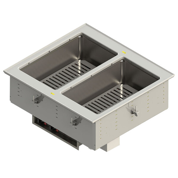 A stainless steel Vollrath drop-in hot food well with two compartments on a counter.