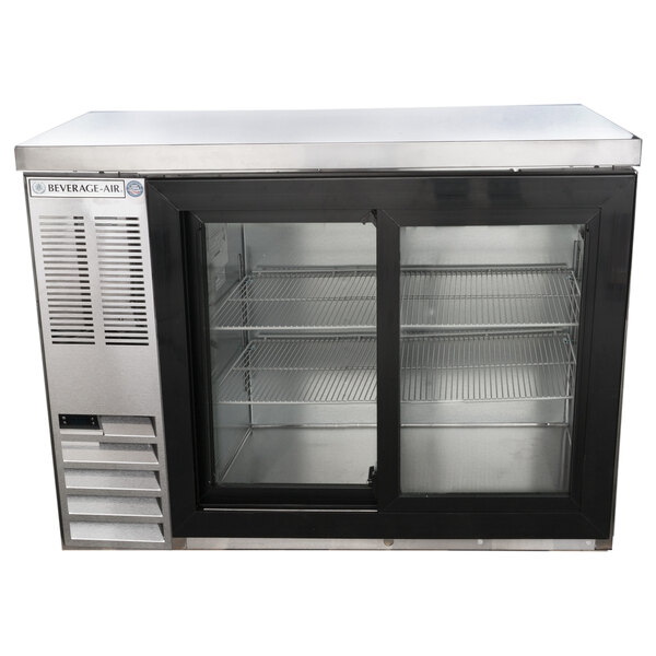 A Beverage-Air stainless steel back bar refrigerator with glass sliding doors.