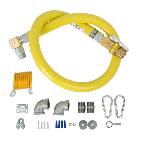 A yellow T&S gas hose with swivel fittings and restraining cable.