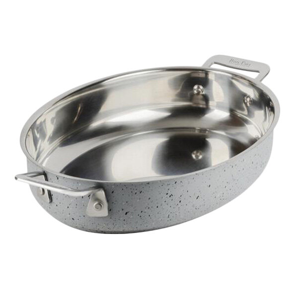A silver Bon Chef stainless steel oval au gratin pan with handles.
