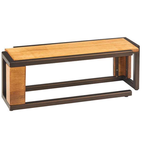 A wooden table with a metal and rustic pine Cal-Mil rectangle riser on top.