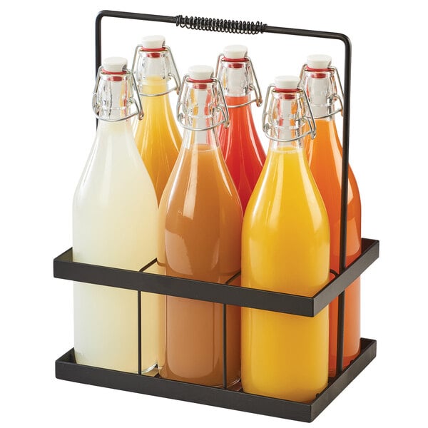 A Cal-Mil wire caddy with 6 glass bottles of liquid.