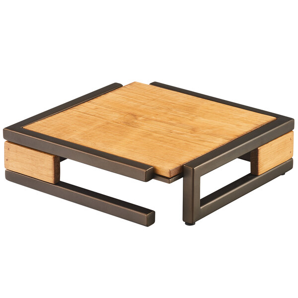 A Cal-Mil Sierra bronze metal and rustic pine square riser with a wood and metal base.