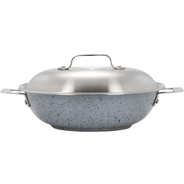 A Bon Chef stainless steel brazier pot with a lid and handle.