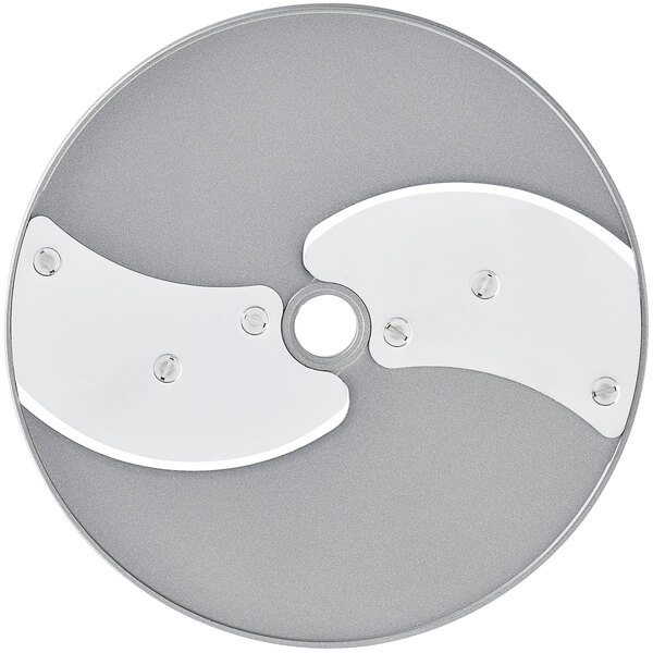 A circular metal Robot Coupe slicing disc with two holes.