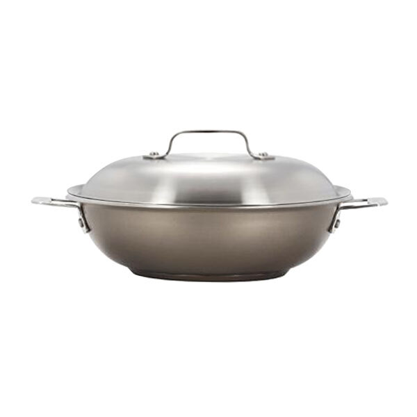 A silver stainless steel Bon Chef brazier pot with a lid.