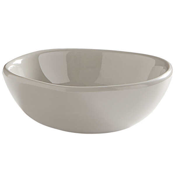 An American Metalcraft white melamine fruit bowl with a small rim.