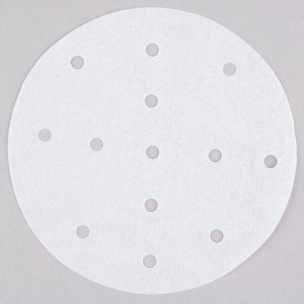 A white circle with black dots.