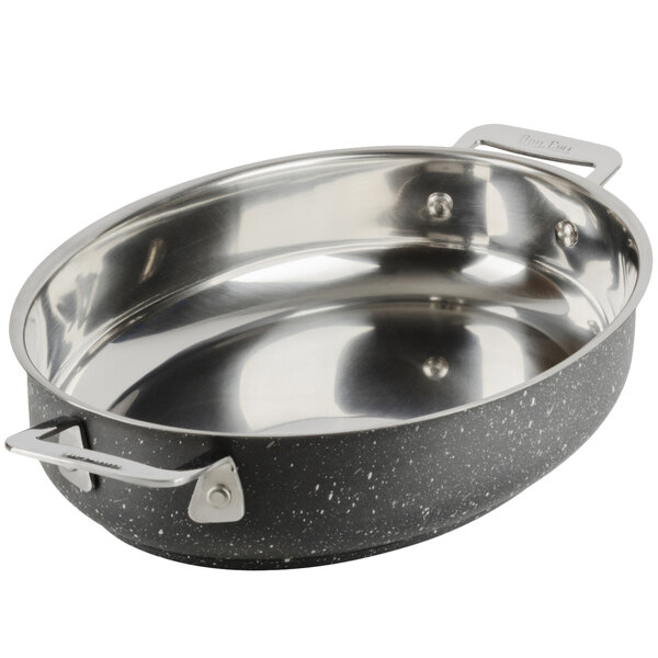 A Bon Chef stainless steel oval au gratin dish with a handle.