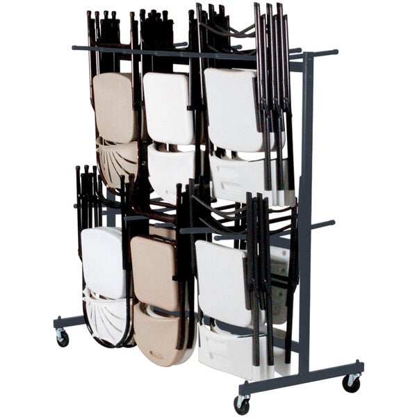 A black Correll hanging folding chair truck with white chairs on it.