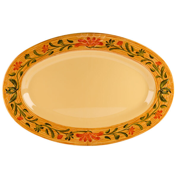 A white oval melamine platter with a floral design.