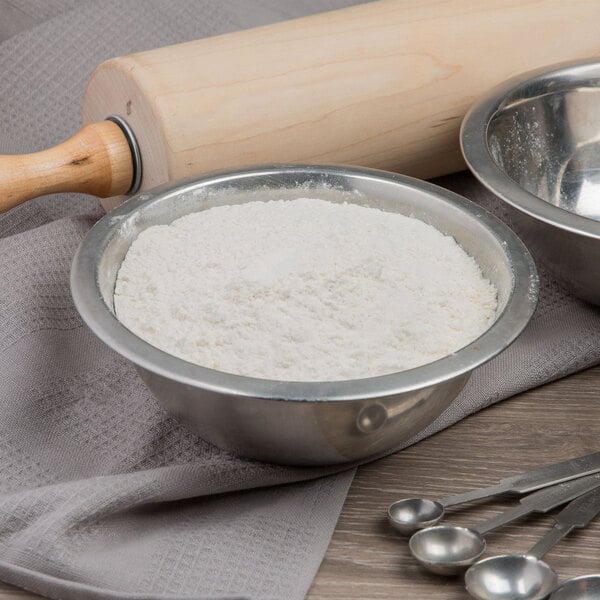A bowl of Caputo 00 pizza flour with a rolling pin.