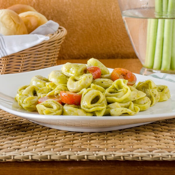 A plate of Seviroli tortellini pasta with tomatoes.