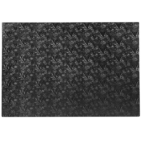 A black rectangular Enjay cake board with a patterned design.