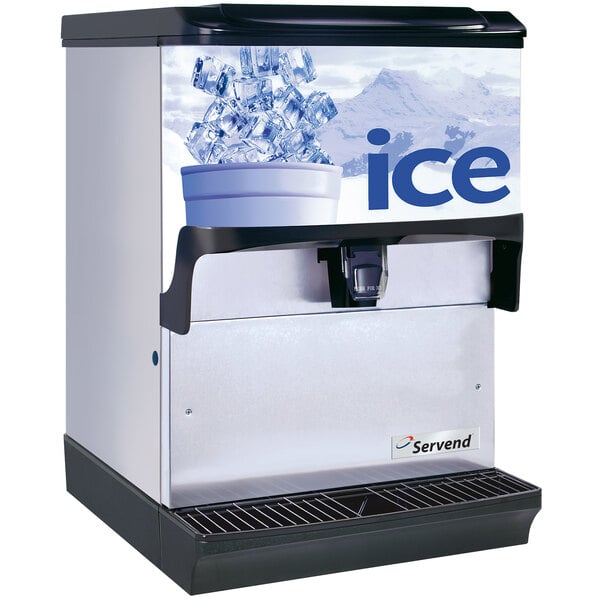 A Servend countertop ice dispenser with ice cubes in it.