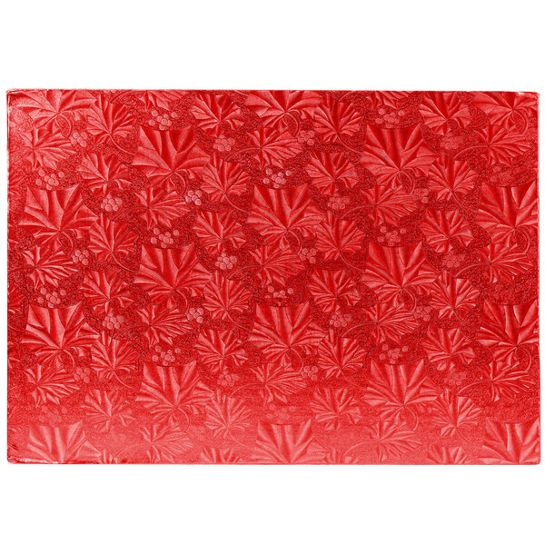 A white rectangular Enjay red cake board with a red floral pattern.