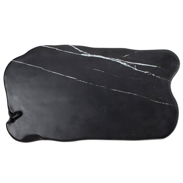 An American Metalcraft faux black marble serving board with a black and white marbled surface and organic shape.