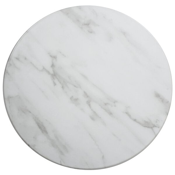An American Metalcraft white marble round melamine serving board with black veins.