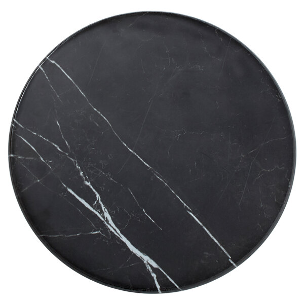 An American Metalcraft round melamine serving board with a black marble pattern and white lines.