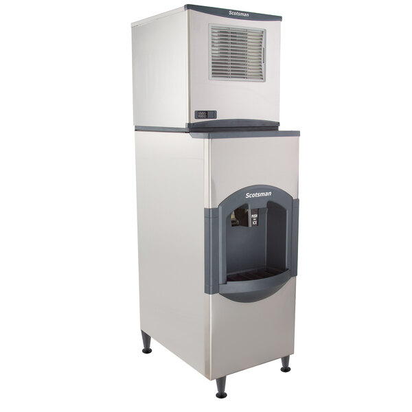 A large white and grey Scotsman Prodigy Plus ice machine with a water dispenser.