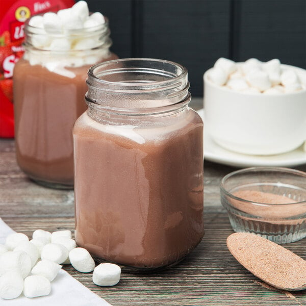 A Touch of Dutch 5 lb. Bag of Premium Hot Chocolate Mix with marshmallows in it.