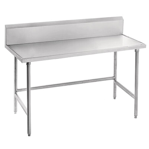 A white rectangular Advance Tabco stainless steel work table with backsplash.