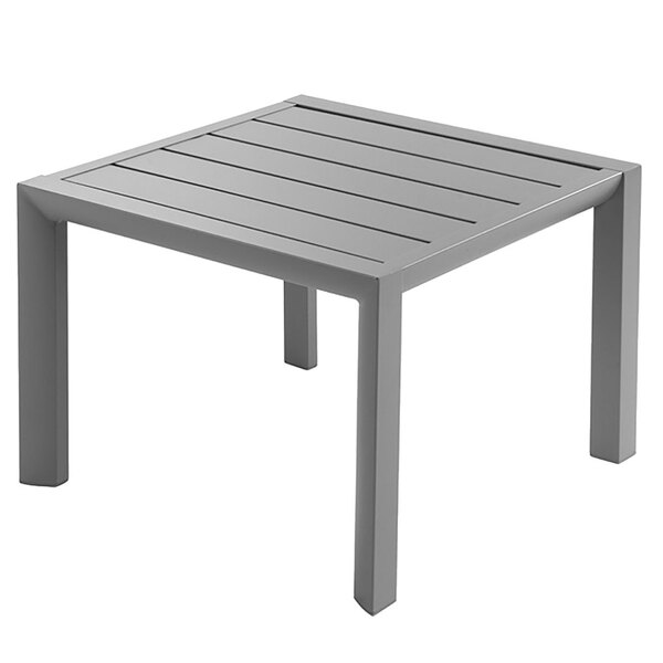 A Grosfillex Sunset platinum gray square low outdoor table with legs.