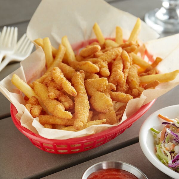 A basket of Misty Harbour breaded fried clam strips served with fries and coleslaw.