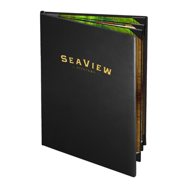 A black leather-like Menu Solutions CD960D Chadwick Collection menu cover with gold text on a table in a seafood restaurant.