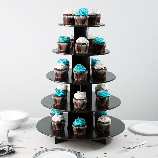 A black Enjay 5-tier cupcake stand with cupcakes on it.