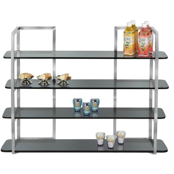 A silver Eastern Tabletop stainless steel riser with glass shelves holding drinks.