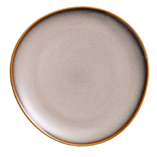A close up of a Oneida Sama porcelain plate with a white background and brown rim.