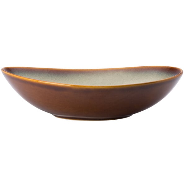 A brown bowl with a white rim.