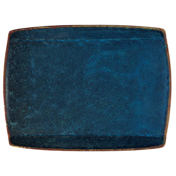 An Oneida Studio Pottery Blue Moss rectangular porcelain plate with brown edges.