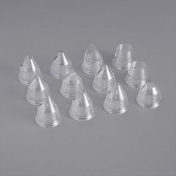 A clear plastic cone-shaped container holding 10 Matfer Bourgeat interchangeable pastry tips.