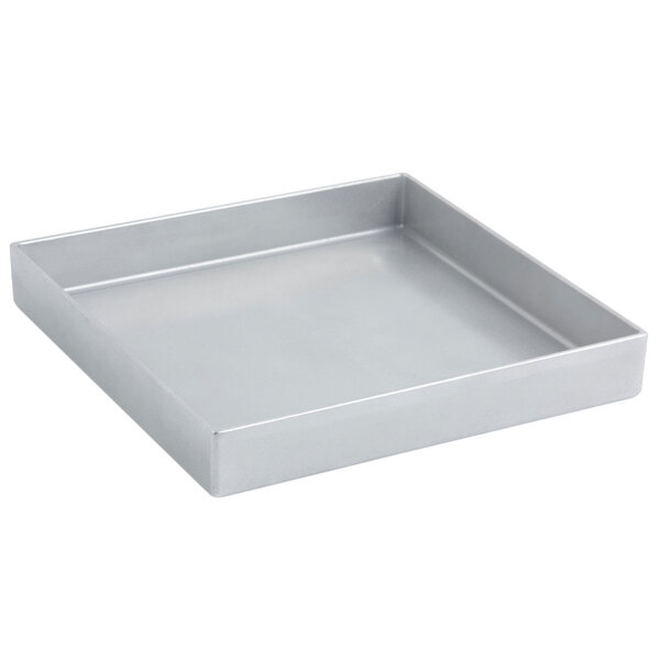 A Bon Chef pewter-glo square bowl on a counter.