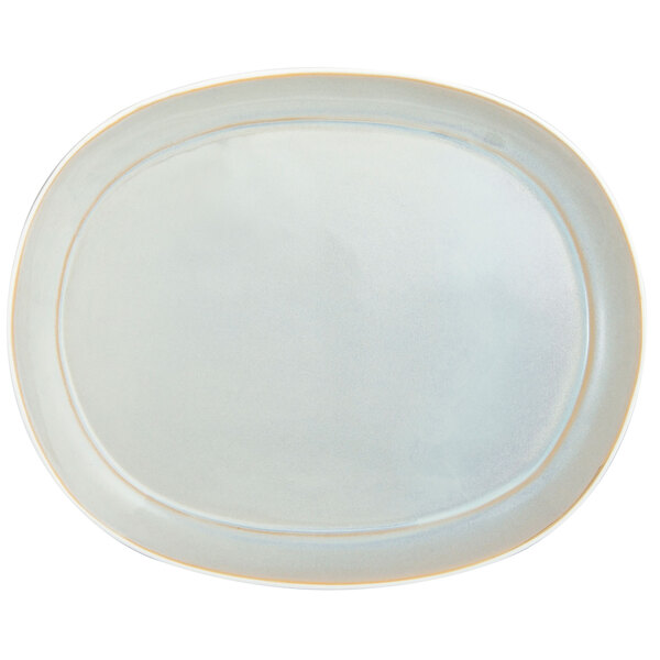 A white porcelain oval platter with a light blue rim and gold accents.
