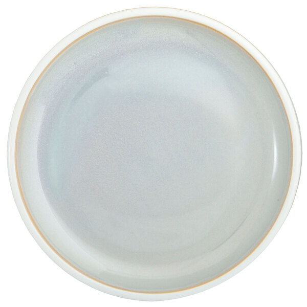 A close-up of a white Oneida Studio Pottery Stratus porcelain round plate with a light gray rim.