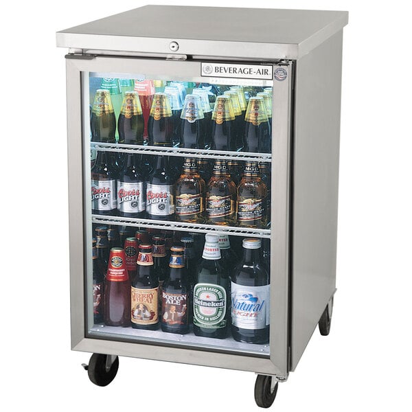 A Beverage-Air stainless steel back bar refrigerator with glass doors filled with beer bottles.