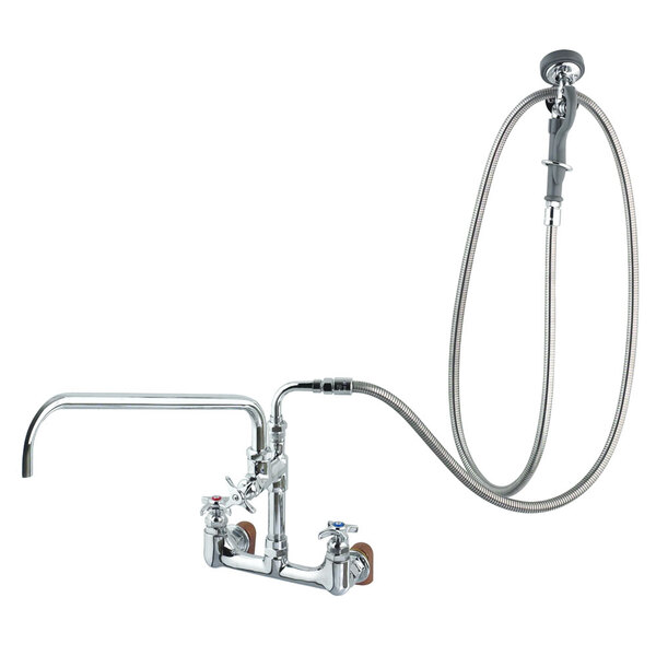 A T&S wall mounted pre-rinse faucet with a hose and angled spray valve.