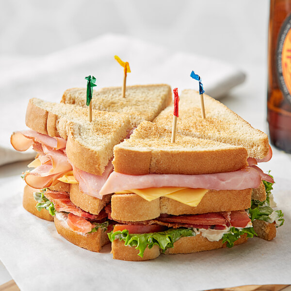 A sandwich with a toothpick in it.