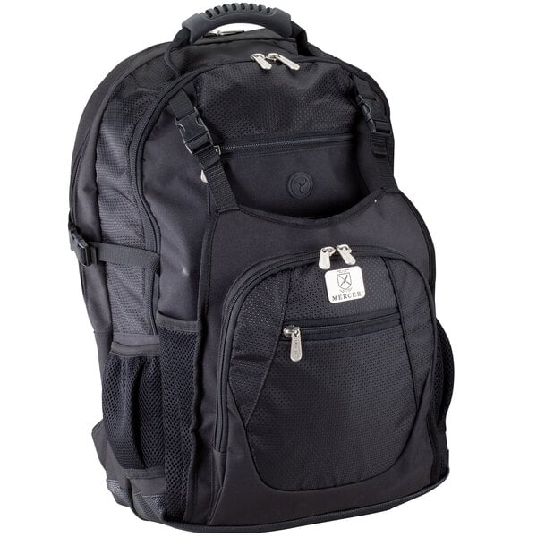 A black Mercer Culinary KnifePack Plus backpack with zippers and a white logo.