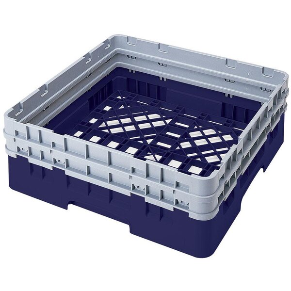 A navy blue Cambro dish rack with closed sides and 2 extenders.
