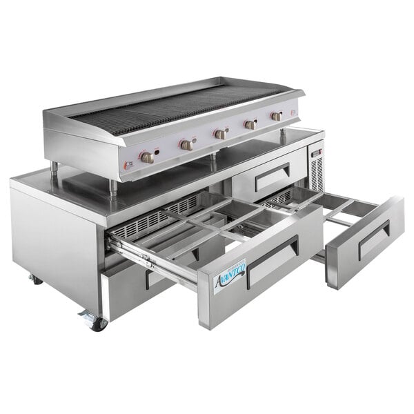 A Cooking Performance Group stainless steel gas lava briquette charbroiler over a stainless steel chef base with drawers.