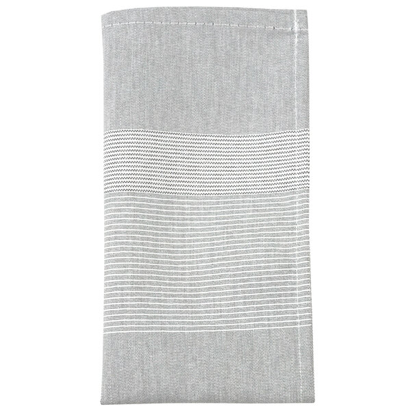 A black cloth napkin with gray and white stripes.