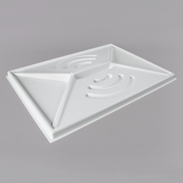 A white plastic night cover with a triangular design.