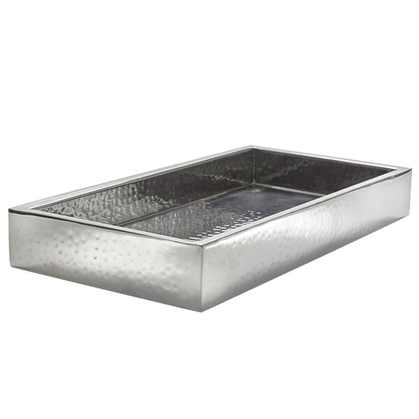 An American Metalcraft rectangular stainless steel crate with a hammered texture on a table.