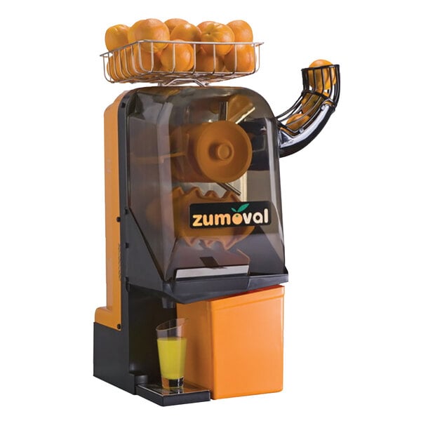 A basket of oranges on a Zumoval Minimax Compact orange juice machine.