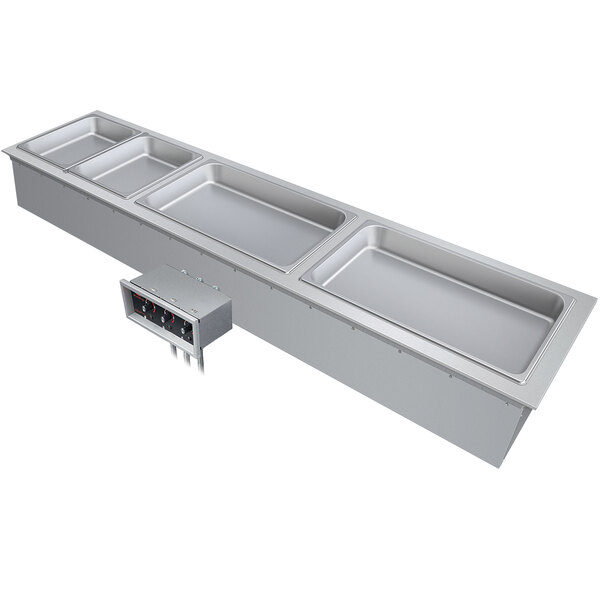A stainless steel Hatco drop-in hot food well with three compartments.