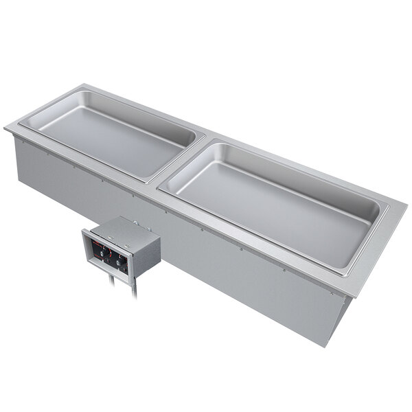 A stainless steel Hatco drop-in hot food well on a counter.